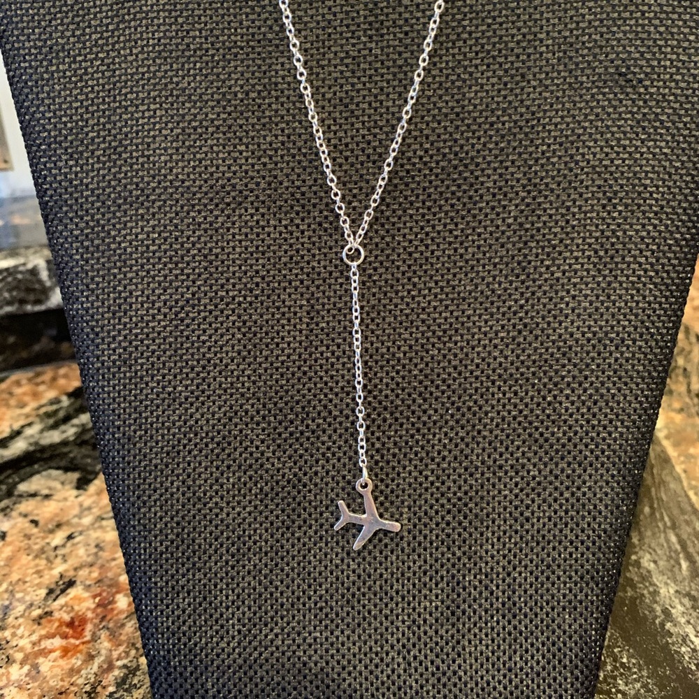 Silver tone airplane necklace